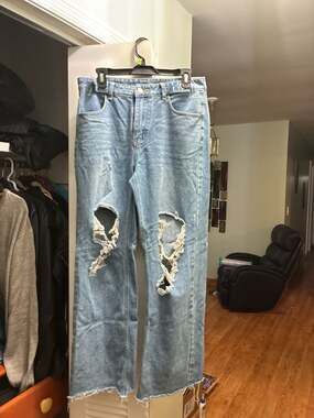 Distressed Light Wash Wide Leg Raw Hem Denim Jeans